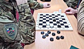 В ОМОН «АХМАТ-1» прошел турнир по шашкам, приуроченный к юбилейным датам Росгвардии