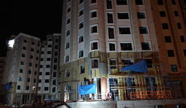 В новом районе им. В. В. Путина ведутся работы по остеклению домов на первой линии застройки